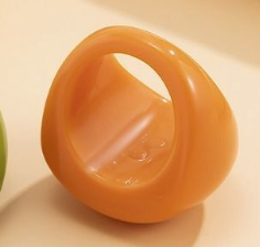 Orange ring showing the size of the finger space