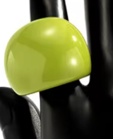 Green acrylic dome shape ring on a black background