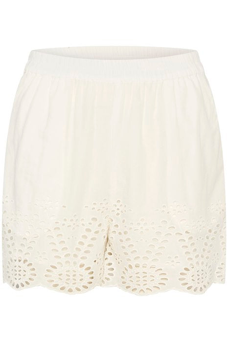 White women’s eyelet shorts with elastic waist and scalloped cutwork hem, lightweight summer pull-on style.